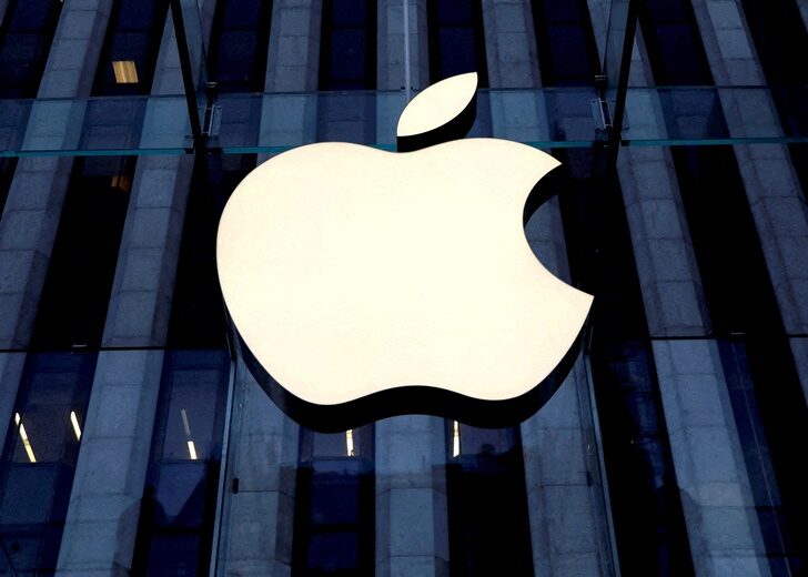 FILE PHOTO: The Apple logo is seen hanging at the entrance to the Apple store on 5th Avenue in Manhattan, New York, U.S., October 16, 2019. REUTERS/Mike Segar/