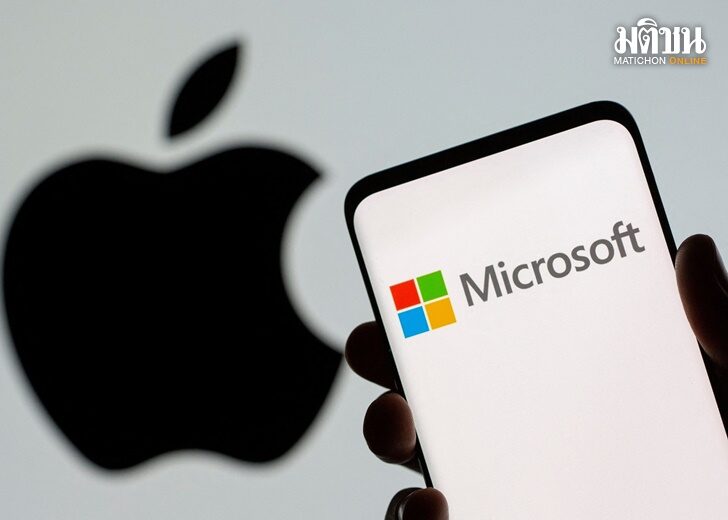 FILE PHOTO: Microsoft logo is seen on the smartphone in front of displayed Apple logo in this illustration taken