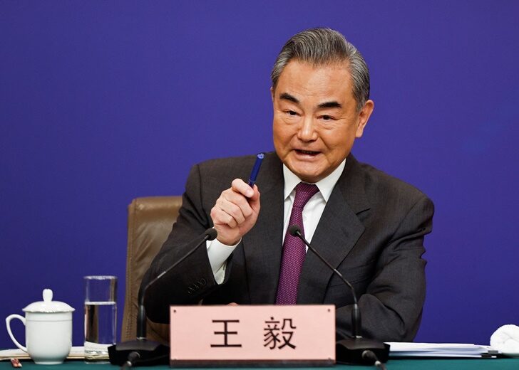 Chinese Foreign Minister Wang Yi attends a press conference on the sidelines of the NPC, in Beijing