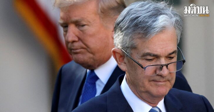 FILE PHOTO: U.S. President Donald Trump looks on as Jerome Powell, his nominee to lead the Fed moves to the podium at the White House
