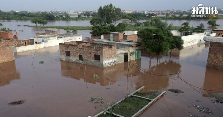 Houses are partially submerged on the banks of flooded Ravi river, in Lahore