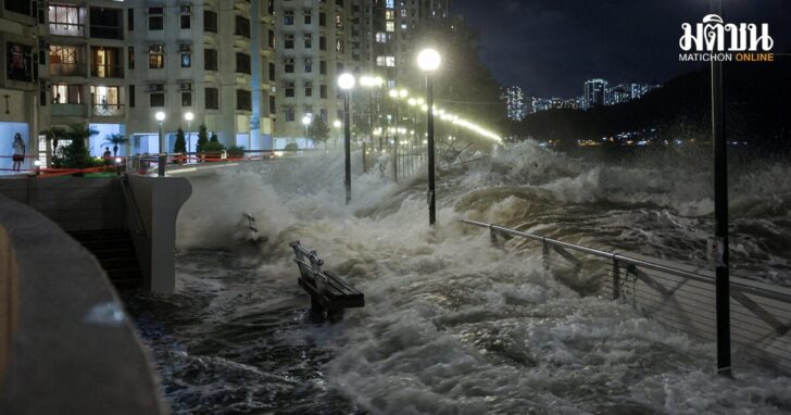 Waves from Super Typhoon Ragasa crash onto chairs by the shore in Hong Kong