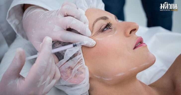 Woman receiving botox injection at clinic