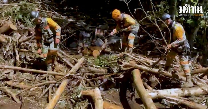 Rescue workers operate following rains and flooding, in Huauchinango