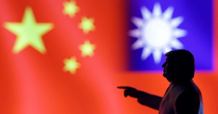 FILE PHOTO: Illustration shows 3D-printed miniature model depicting U.S. President Donald Trum, Chinese flag and fragment of Taiwanese flag