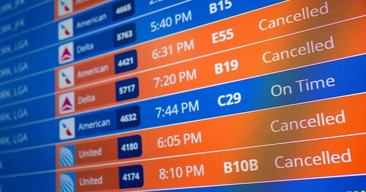 Flight timings and cancellations are displayed on a departures board
