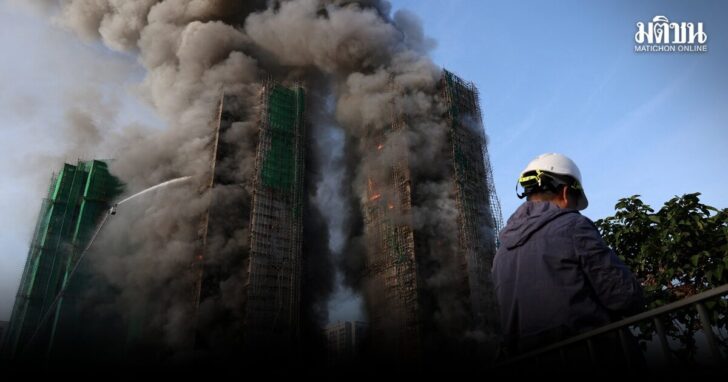 Flames engulf bamboo scaffolding across multiple buildings at Wang Fuk Court housing estate, in Tai Po