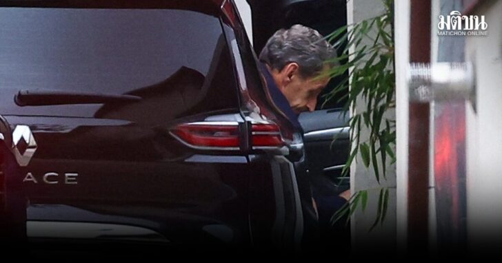 Former French President Sarkozy arrives at his house after being released from jail, in Paris