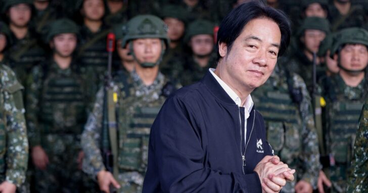 Taiwan President Lai Ching-te inspects reservists during a training session at Loung Te Industrial Parks Service Center in Yilan