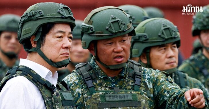 FILE PHOTO: A soldier speaks to Taiwan's President Lai Ching-te in Hsinchu