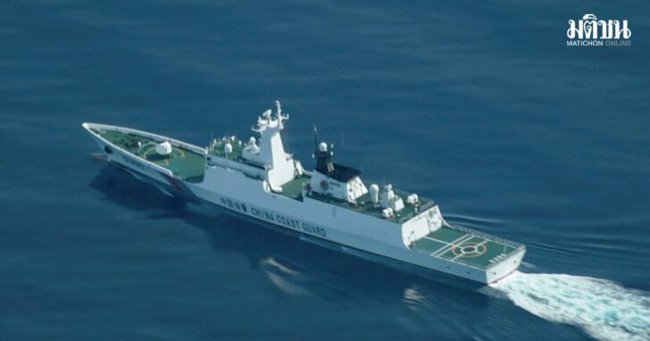 FILE PHOTO: An aerial view of a China Coast Guard ship navigating near the disputed Scarborough Shoal, as Philippine Coast Guard aircraft carrying journalists patrols the area