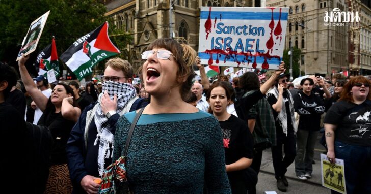 Demonstrators gather during a protest against Israeli President Isaac Herzog's visit to Australia, in Melbourne