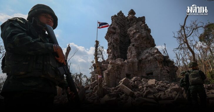 Soldiers stand guard next to Prasat Ta Khwai, a site of clashes between Thailand and Cambodia in December 2025, in Surin province