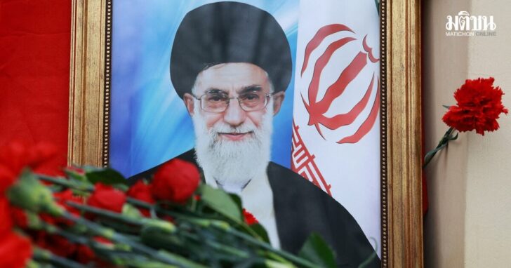 People bring flowers to the Iranian embassy in Moscow