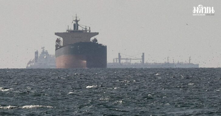 FILE PHOTO: Cargo ships in the Gulf, near the Strait of Hormuz