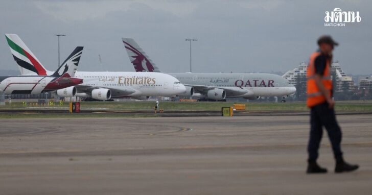 Emirates and Qatar Airways planes sit on the tarmac at Sydney Kingsford Smith Airport in Sydney