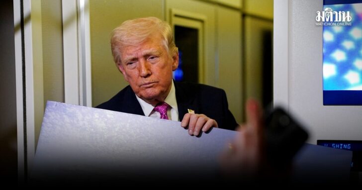 FILE PHOTO: U.S. President Donald Trump on board Air Force One for travel to Joint Base Andrews