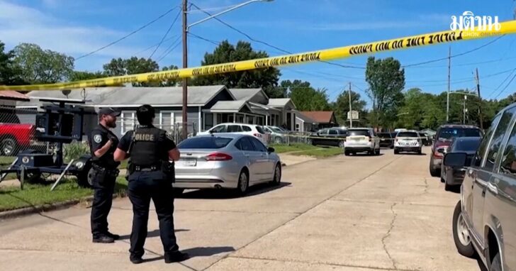 Police officers secure the scene where eight children, with ages ranging from 1 to 14, were killed in a mass shooting in Shreveport