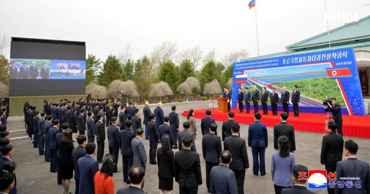 FILE PHOTO: Ground-breaking ceremony for a new road bridge spanning the Tumen River that will link North Korea to Russia