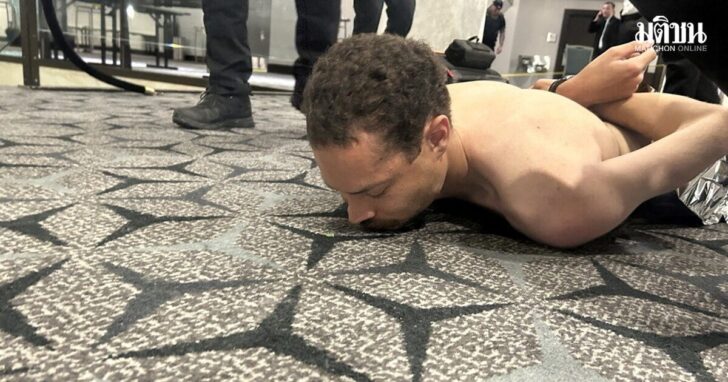 Law enforcement personnel detain Cole Tomas Allen, a suspect in the shooting incident at the White House Correspondents' Association dinner, in Washington