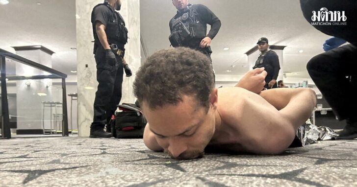 Law enforcement personnel detain Cole Tomas Allen, a suspect in the shooting incident at the White House Correspondents' Association dinner, in Washington
