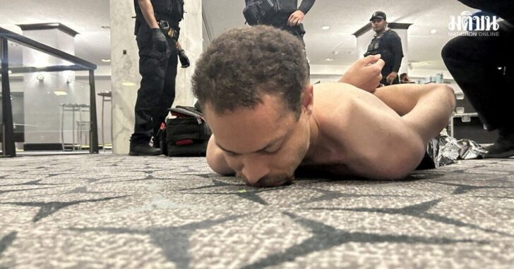 Law enforcement personnel detain Cole Tomas Allen, a suspect in the shooting incident at the White House Correspondents' Association dinner, in Washington