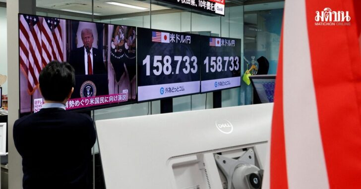 A TV screen broadcasts U.S. President Donald Trump's speech about the Iran war next at the foreign exchange trading company in Tokyo