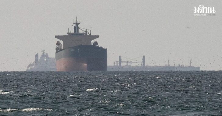 FILE PHOTO: Cargo ships in the Gulf, near the Strait of Hormuz