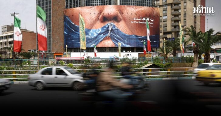 People drive past anti-U.S. billboard depicting U.S. President Donald Trump and the Strait of Hormuz, in Tehran