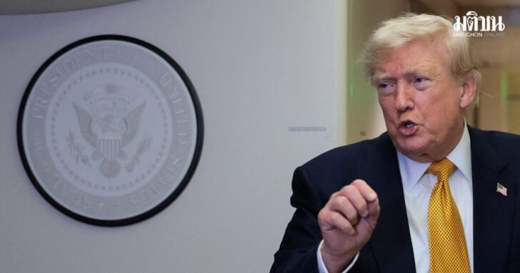 U.S. President Trump speaks to reporters mid-flight in the press cabin of the new Air Force One