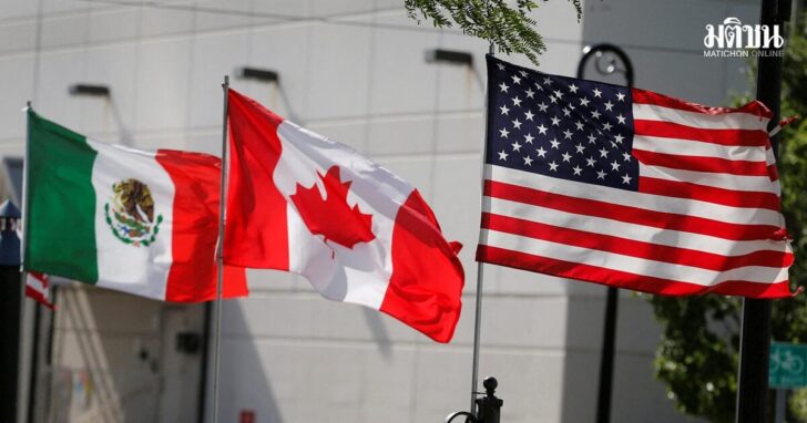 FILE PHOTO: Flags of the U.S., Canada and Mexico fly next to each other in Detroit, Michigan