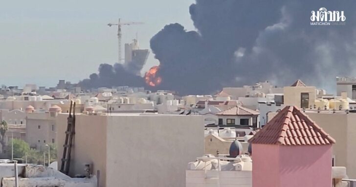 Smoke billows near the oil facility in Mangaf