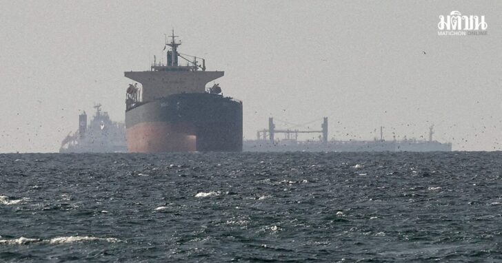 FILE PHOTO: Cargo ships in the Gulf, near the Strait of Hormuz