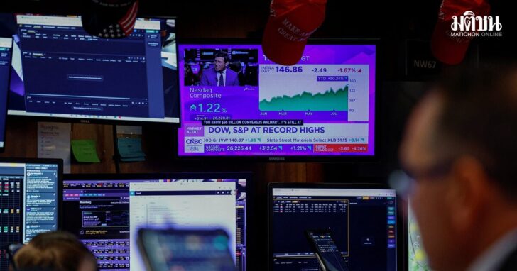 Traders work on the floor of the New York Stock Exchange (NYSE) in New York City