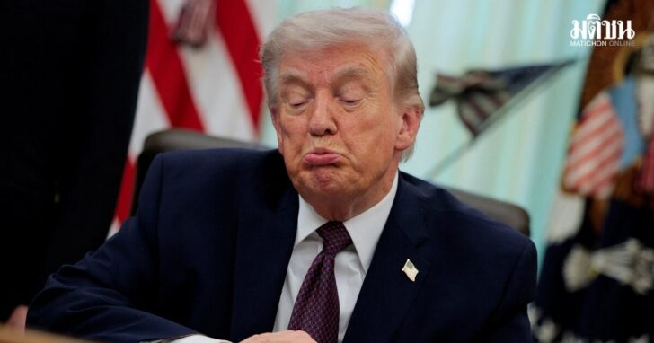 U.S. President Trump signs an executive order in the Oval Office of the White House