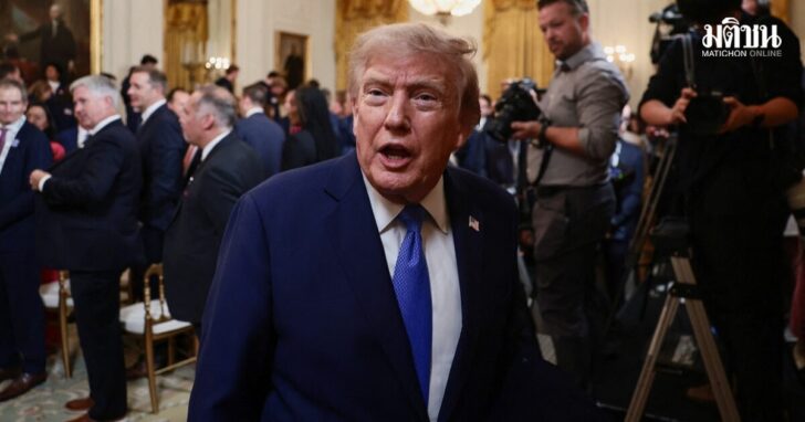 U.S. President Donald Trump participates in a Team USA reception in the East Room at the White House