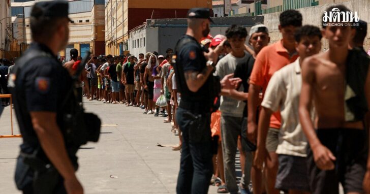 FILE PHOTO: Mass crossings of migrants on foot and by sea from Morocco into Spanish territory, in Ceuta