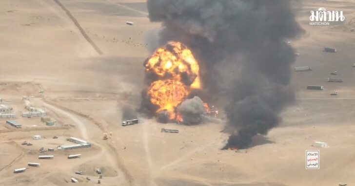 Smoke rises from trucks, near Al-Wadiah
