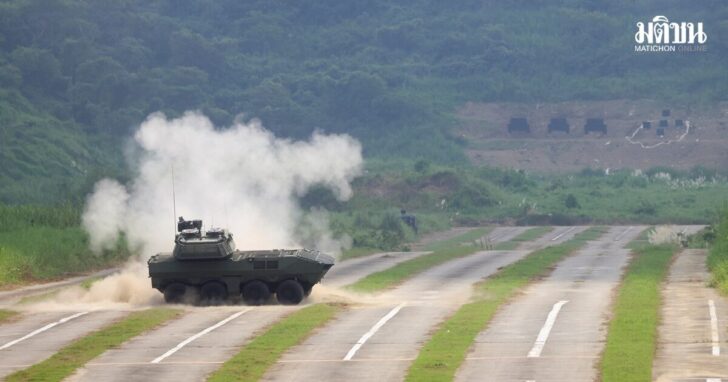 Wheeled armoured vehicle fires during a live-fire demonstration in Tainan