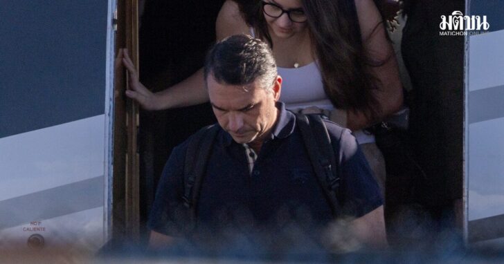 Brazilian Senator Flavio Bolsonaro disembarks from a plane after arriving at Opa-locka Executive Airport near Miami